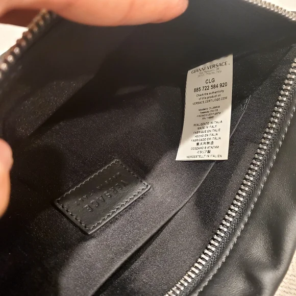 Brand new Versace leather clutch wrislet